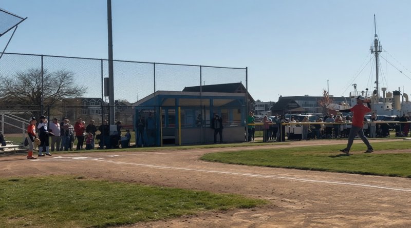 Lewes Little League Volunteer of the Year Ben Gordy throws out the first pitch. SUBMITTED PHOTOS